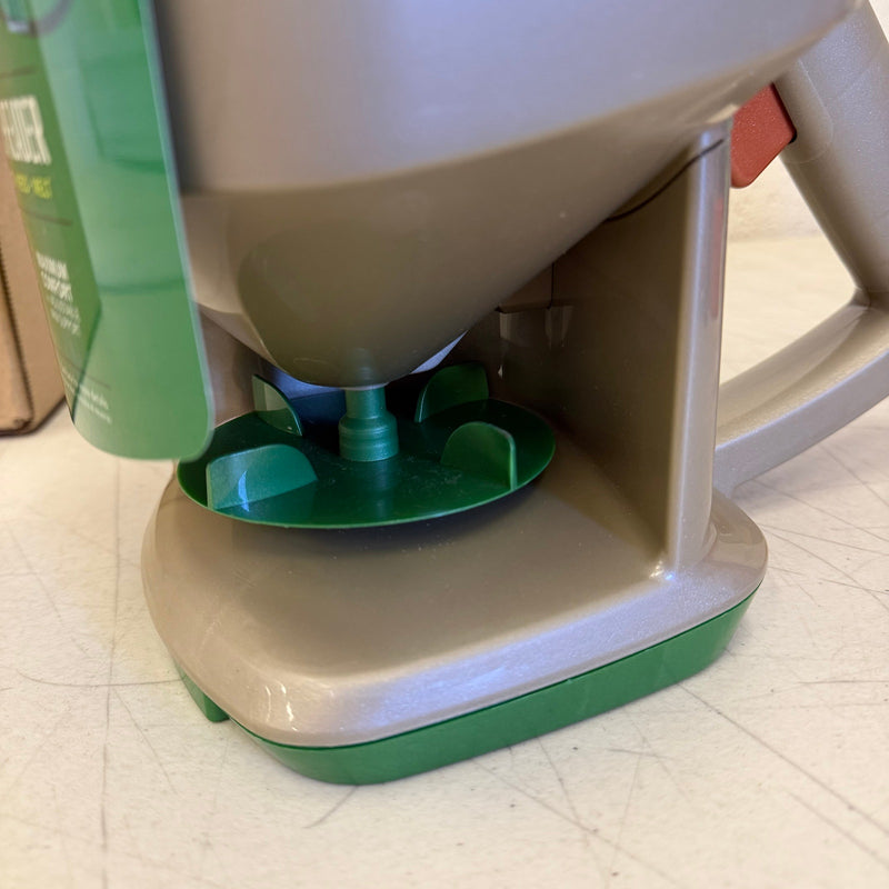 Scotts Whirl Hand-Powered Spreader for Grass Seed, Fertilizer, Salt & Ice Melt