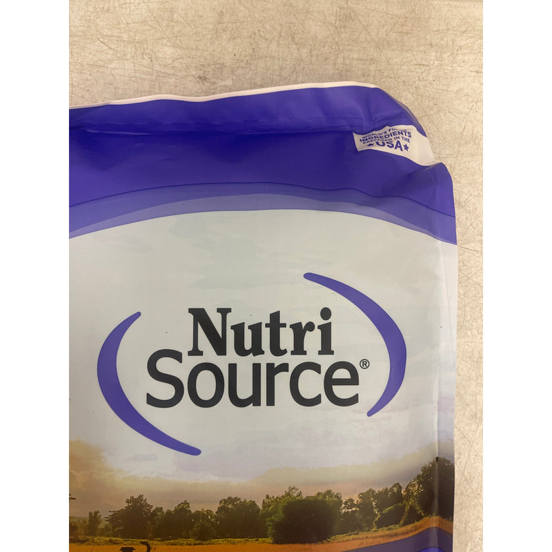 Alimento seco para cachorros NutriSource, elaborado con harina de pollo y arroz, 15 lb